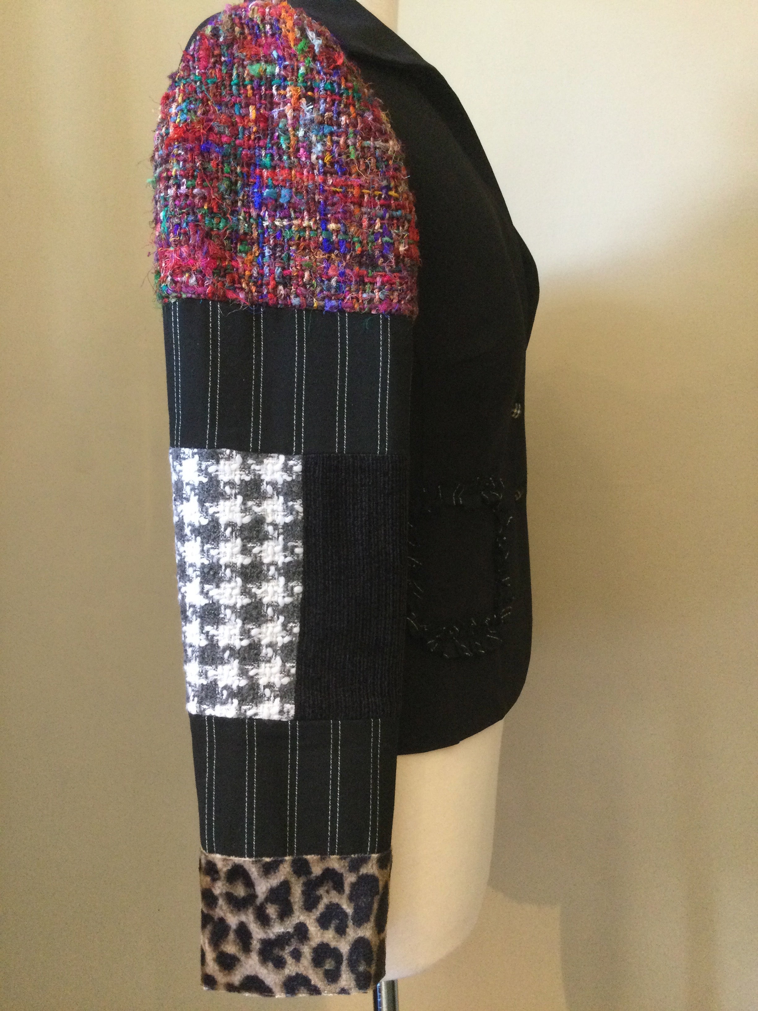 Medium Black fitted little  jacket with patchwork sleeves